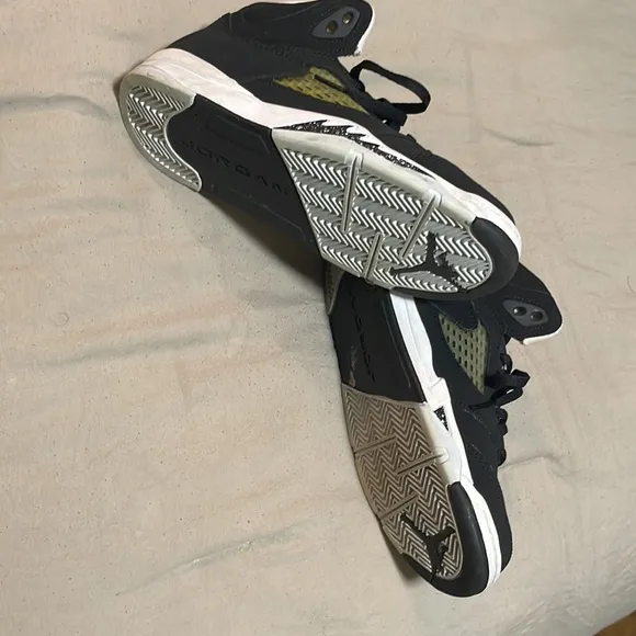 Air Jordans black suede, size 3 in boys. In good condition.