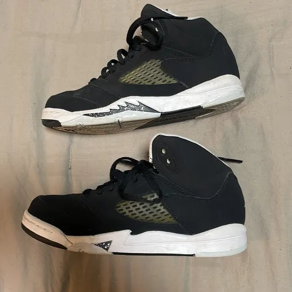 Air Jordans black suede, size 3 in boys. In good condition.