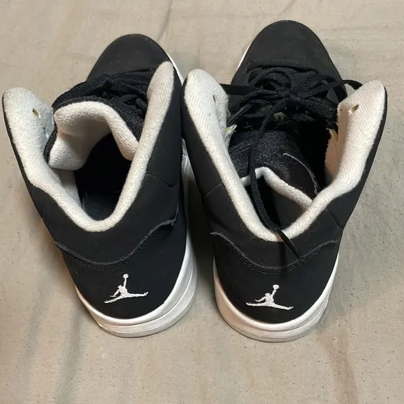 Air Jordans black suede, size 3 in boys. In good condition.